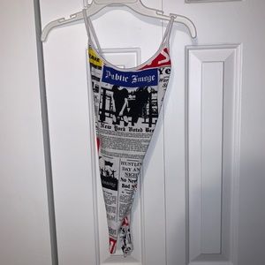 A romper designed like a newspaper
